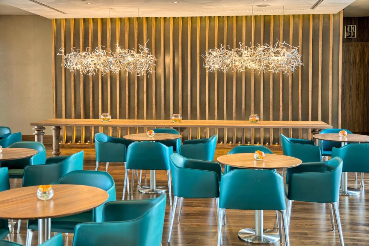 Epic Sana Lisboa Hotel Екстер'єр фото The lounge at the airport