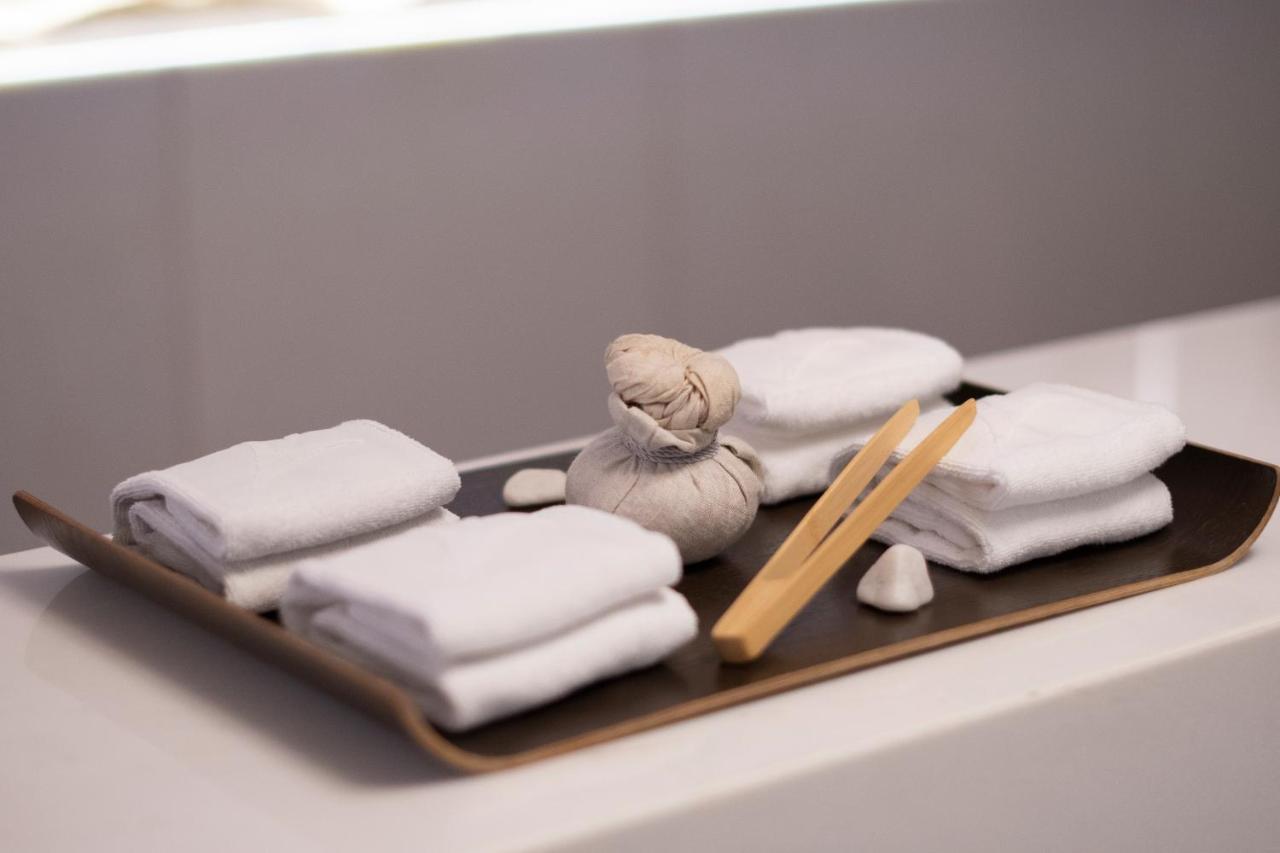 Epic Sana Lisboa Hotel Екстер'єр фото A set of folded towels
