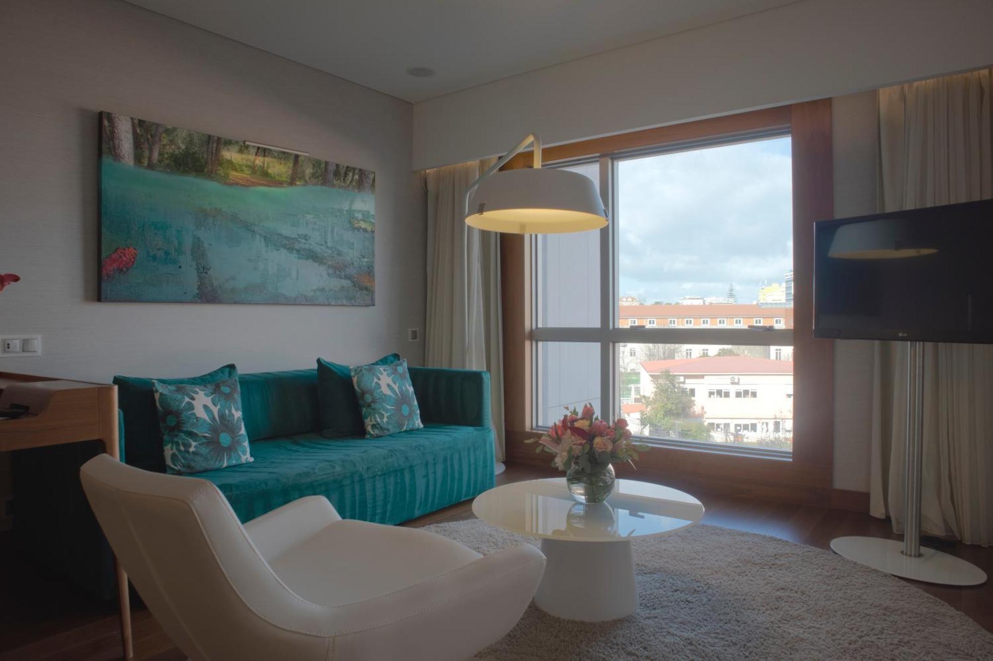 Epic Sana Lisboa Hotel Номер фото A living room at the hotel